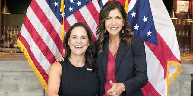 South Dakota Gov. Kristi Noem meets with then-Ohio GOP chair Jane Timken at an Ohio Republican Party event in Columbus, Ohio, in September 2020. Noem endorsed Timken's run for Ohio Senate this year. Tuesday, former Trump counselor Kellyanne Conway is joining Noem on the list of high-profile Trump allies to back Timken.