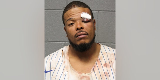 Clark appears in a mug shot following his arrest Sunday. He faces a lead charge of aggravated assault on a peace officer.