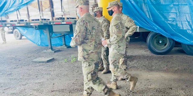 Guardsmen continuing to stage MREs, water and supersacks of sand in preparation to respond to the citizens of Louisiana after Hurricane Ida makes landfall. A Guard soldier was found dead Friday in a Department of Public Safety parking lot in Baton Rouge.