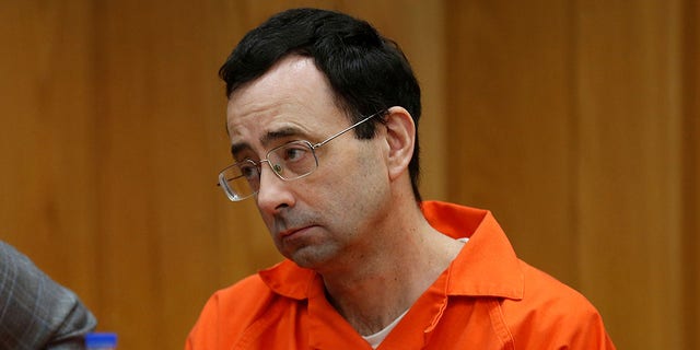 Larry Nassar, a former team USA Gymnastics doctor who pleaded guilty in November 2017 to sexual assault charges, sits in the courtroom during his sentencing hearing in the Eaton County Court in Charlotte, Michigan, U.S., February 2, 2018. 