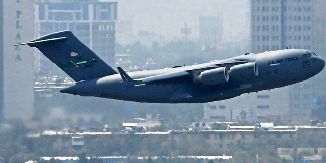 An Air Force aircraft takes off from the airport in Kabul on Aug. 30, 2021.
