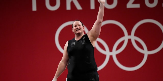 Laurel Hubbard of New Zealand waving during a weightlifting event at the 2020 Summer Olympics on Aug. 2, 2021, in Tokyo. 