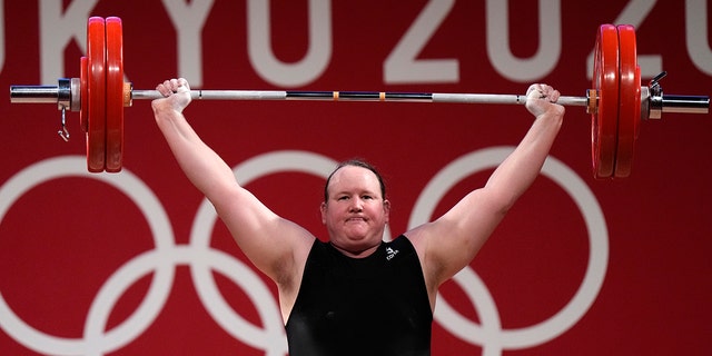 Laurel Hubbard of New Zealand competes in the women's weightlifting event at the 2020 Summer Olympics, Aug. 2, 2021, in Tokyo.
