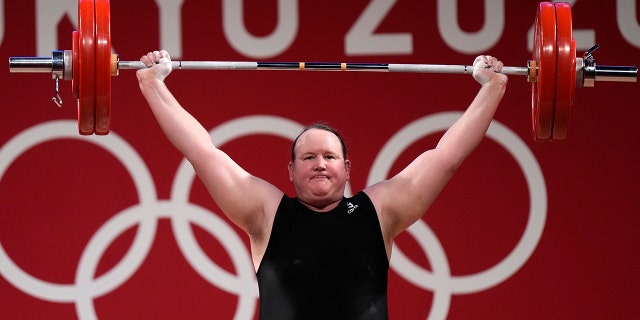 Laurel Hubbard of New Zealand competes in the women's weightlifting event at the 2020 Summer Olympics, Aug. 2, 2021, in Tokyo.