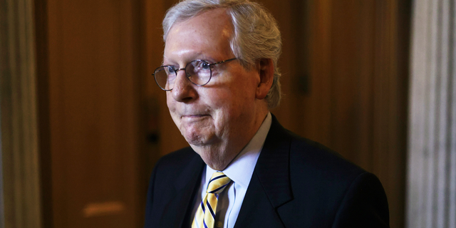 U.S. Senate Minority Leader Sen. Mitch McConnell, R-Ky., walks in a hallway after a vote at the Senate chamber at the U.S. Capitol June 22, 2021, in Washington, D.C. (Photo by Alex Wong/Getty Images)