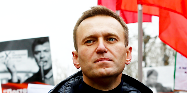 Russian opposition leader Alexei Navalny takes part in a march at Strastnoy Boulevard in memory of Russian politician and opposition leader Boris Nemtsov on the fourth anniversary of his death in Moscow, Russia, on Feb. 24, 2019. Boris Nemtsov was shot dead on Bolshoi Moskvoretsky Bridge in the evening of February 27, 2015.