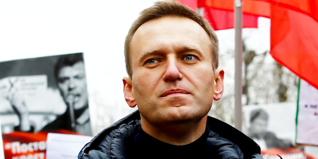 Russian opposition leader Alexei Navalny takes part in a march at Strastnoy Boulevard in memory of Russian politician and opposition leader Boris Nemtsov on the fourth anniversary of his death in Moscow, Russia, on Feb. 24, 2019. Boris Nemtsov was shot dead on Bolshoi Moskvoretsky Bridge in the evening of February 27, 2015.