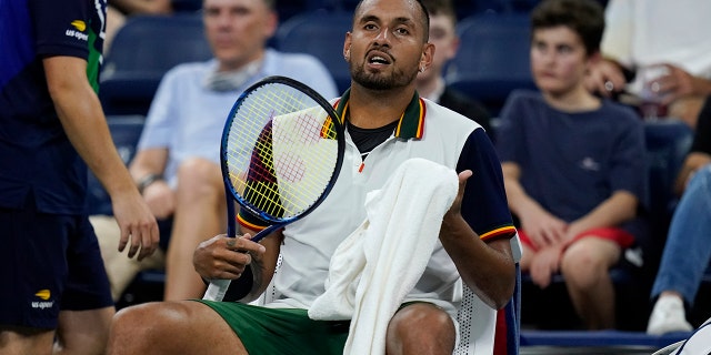 Nick Kyrgios, of Australia, rests between games against Roberto Bautista Agut, of Spain, during the first round of the US Open tennis championships, Monday, Aug. 30, 2021, in New York. (AP Photo/Frank Franklin II)