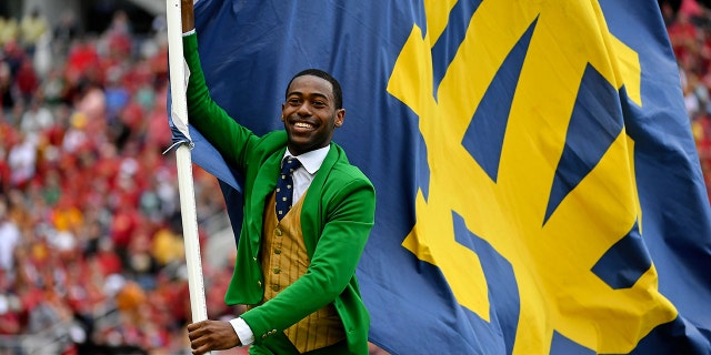The Notre Dame Fighting Irish mascot celebrates a field goal.