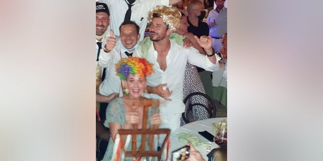 Katy Perry and Orlando Bloom were seen enjoying a rowdy night in the Taverna Anema e Core Nightclub in Capris, Italy.