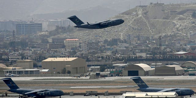 A U.S. Air Force aircraft takes off from the airport in Kabul on Aug. 30, 2021.