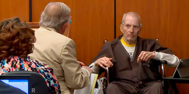 In this still image taken from the Law & amp;  Video of the Crime Network court, property successor Robert Durst, right, describes what ailments he had to attorney Dick Deguerin during his murder trial in Los Angeles County Superior Court in Inglewood, California.