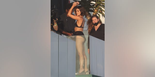 Lucy Hale models sexy black lingerie on a beachfront balcony photoshoot in Malibu. The Pretty Little Liars actress, 32 showed off her amazing figure in black lace lingerie as she posed on the balcony.