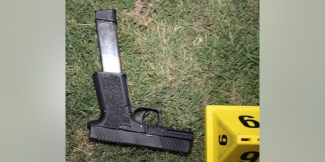 Investigators found two handguns with additional magazines after the confrontation, police said. 