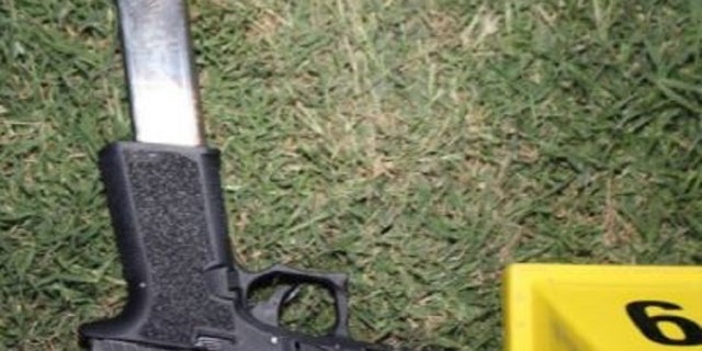 Investigators found two handguns with additional magazines after the confrontation, police said.