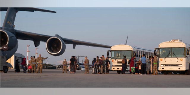 Afghan evacuees arrive in Germany. (Department of Defense)