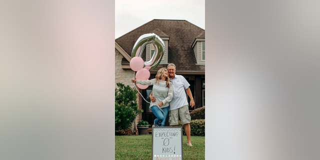 The duo posed with a giant "0" balloon and a sign that read "Expecting 0 kids!"