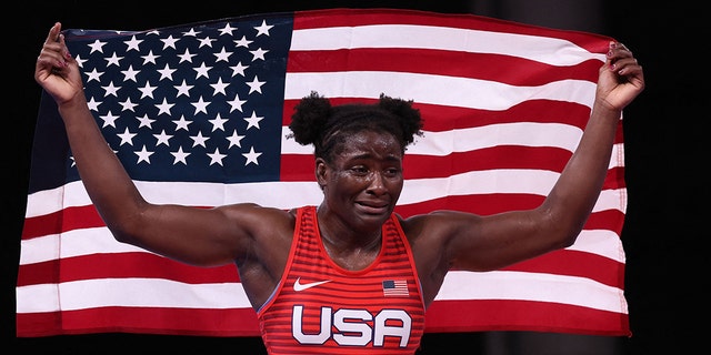 Tamyra Marianna Stock Mensah of America celebrates her gold medal victory over Nigeria's Blessing Oborududu in their women's 68kg freestyle final match of the Tokyo 2020 Olympic Games at Makuhari Messe in Tokyo on August 3, 2021. ( Photo by Jack GUEZ / AFP) (Photo by JACK GUEZ / AFP via Getty Images)