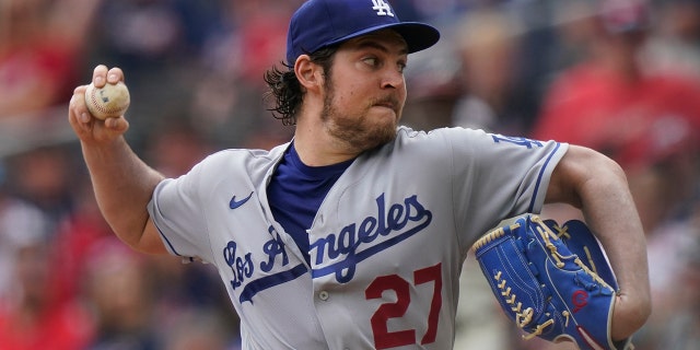 FILE - In this photo from June 6, 2021, Los Angeles Dodgers starting pitcher Trevor Bauer delivers in the first inning of a baseball game against the Atlanta Braves in Atlanta. (AP photo / Brynn Anderson, file)