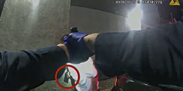 San Diego police fatally shoot armed man behind fast food restaurant, bodycam footage shows (Credit: San Diego Police Department YouTube)