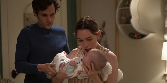 Penn Badgley as Joe (L) and Victoria Pedretti as Love (R) in Season 3 of "You."