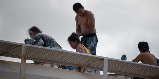 Officials determined the "white powdery substance" that covered the illegal immigrants was clay.