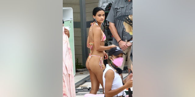 Actress Camila Mendes wears a tiny bikini as she films a scene for the new Netflix movie 'Strangers' in Miami Beach, Florida.