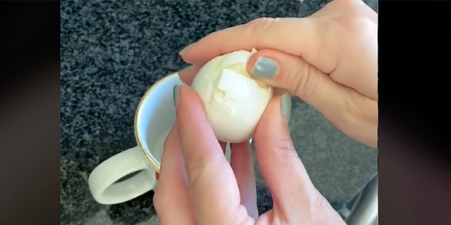 Genevieve Shaw Brown demonstrates her boiled egg peeling hack on TikTok