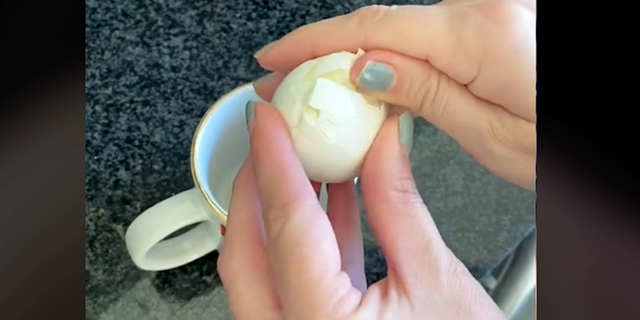 Genevieve Shaw Brown demonstrates her boiled egg peeling hack on TikTok