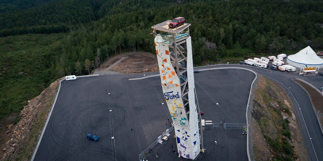 Ford parked an Explorer Plug-In Hybrid atop the world's tallest autonomous climbing tower and gifted it to the climber who reached it fastest.