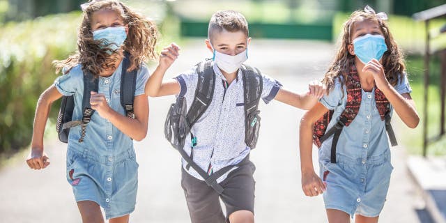 Elementary schoolchildren like those shown here have had flyers made available to them in the lobby of their school district in Moline, Illinois, that discuss activities and information about an after-school ‘Satan club' that meets beginning on Jan. 13, 2022. 