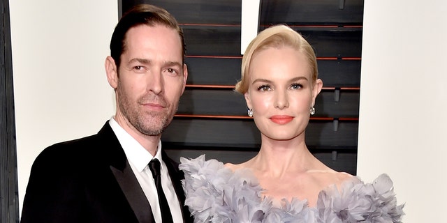 Director Michael Polish (L) and actress Kate Bosworth have decided to end their marriage.
