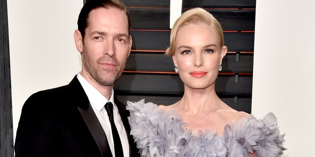 Director Michael Polish (L) and actress Kate Bosworth have decided to end their marriage.