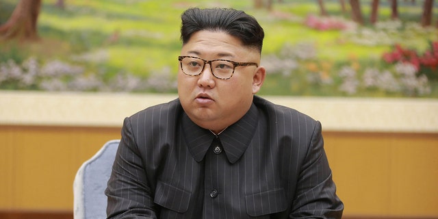 North Korean leader Kim Jong-Un is seen at a meeting with a committee of the Workers' Party of Korea about the test of a hydrogen bomb, at an unknown location, Sept. 3, 2017.