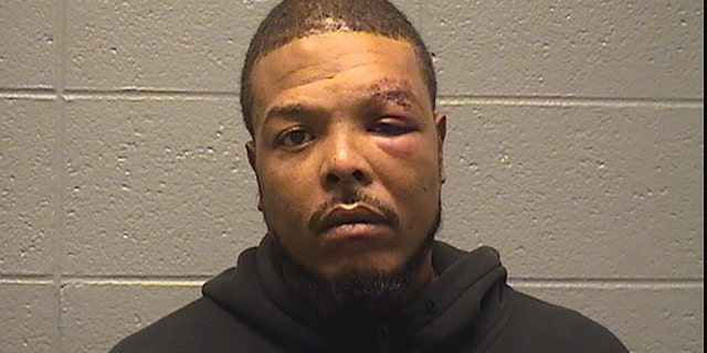 Clark, pictured above in a booking photo, was booked into the Cook County Jail and held on $100,000 bond.