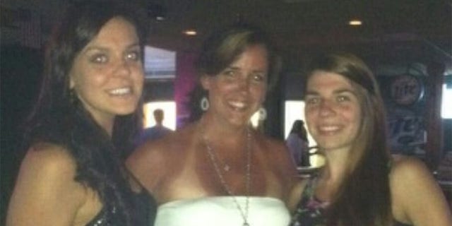 Susan Marie Smuzinsky (center) and her daughters Samantha Smuzinsky(left) and Danielle Smuzinsky (right).