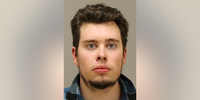 This file photo provided by the Kent County Sheriff, shows Ty Garbin. Prosecutors preparing for the first prison sentence in an alleged plot to kidnap Michigan Gov. Gretchen Whitmer are loudly signaling to five other defendants that a key insider has shared extraordinary details about the operation. Garbin, one of six people charged in federal court, cooperated within weeks of being arrested and prosecutors want a U.S. District Judge to take it into consideration Wednesday, Aug. 25, 2021, when he sentences Garbin for conspiracy. (Kent County Sheriff via AP File)