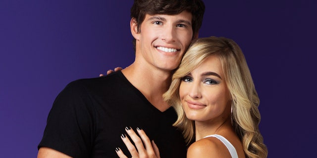 Moriah Plathand her boyfriend Max, from TLC's Welcome to Plathville, pose together at the studio in Cairo, Georgia.