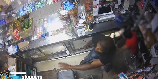 The video showed the man being chased hide behind the store counter and pull a gun.