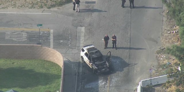 A San Bernardino County Sheriff's deputy was shot Tuesday while trying to make a traffic stop, authorities said. His patrol vehicle was found torched at the scene. 