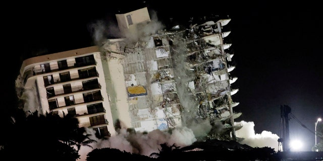 The partially collapsed Champlain Towers South residential building is demolished in Surfside, Fla., July 4, 2021. 