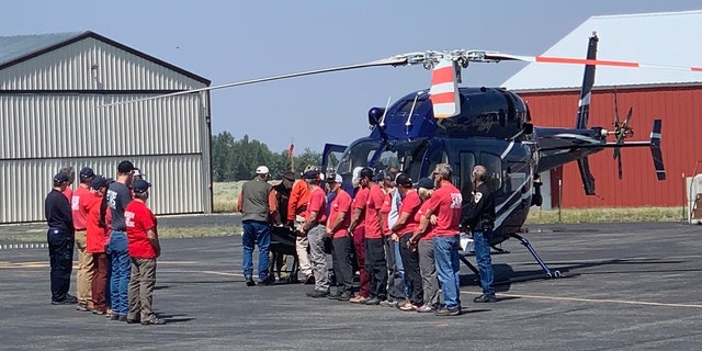 Recovery teams were met by Tatum Morell's family and Red Lodge Fire Rescue personnel at the Red Lodge Airport after recovering the hiker's body from the mountains on Saturday.