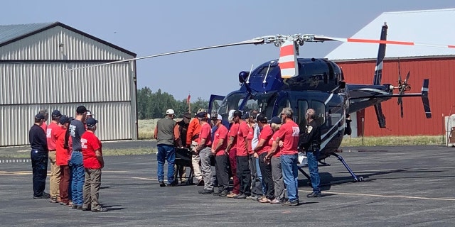 Recovery teams were met by Tatum Morell's family and Red Lodge Fire Rescue personnel at the Red Lodge Airport after recovering the hiker's body from the mountains on Saturday.