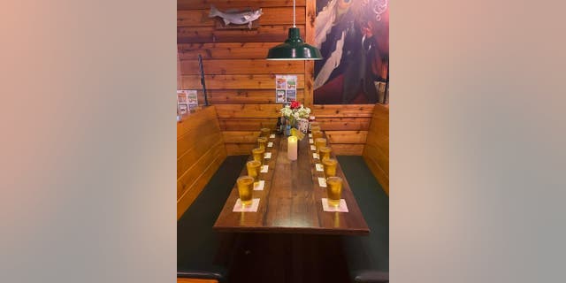 Tyler Scott Parker, the manager of the St. Matthews Texas Roadhouse in Louisville, Ky., poured out 13 pints and set aside a table for the American service members who were killed in a terrorist bombing outside Afghanistan's Hamid Karzai International Airport.