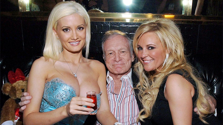 Hugh Hefner's ex-girlfriend Bridget Marquardt says the Playboy Mansion is haunted with a female spirit