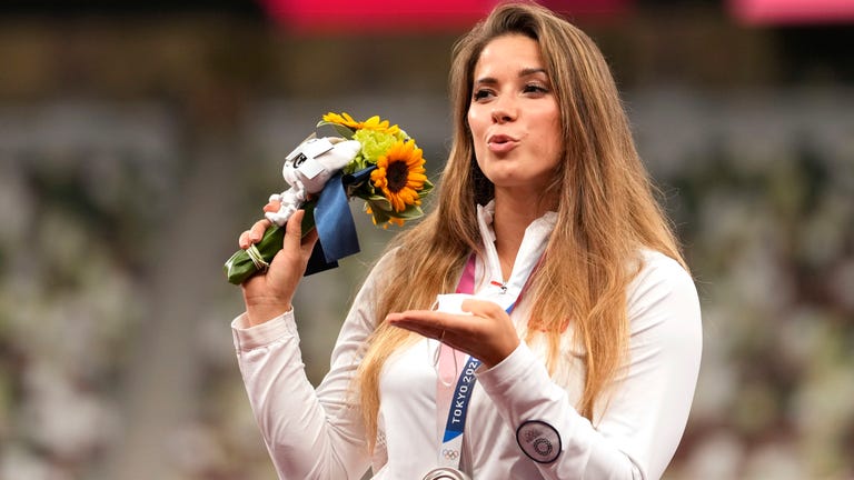 Polish Olympian auctions off medal to help with infant's heart surgery, but winning bidder won't accept