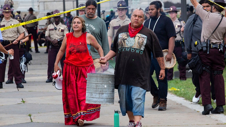 Minnesota governor's mansion targeted by pipeline protesters; 69 arrested