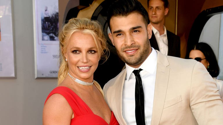 Britney Spears' fiancé Sam Asghari surprises her with a dog: 'Home security'