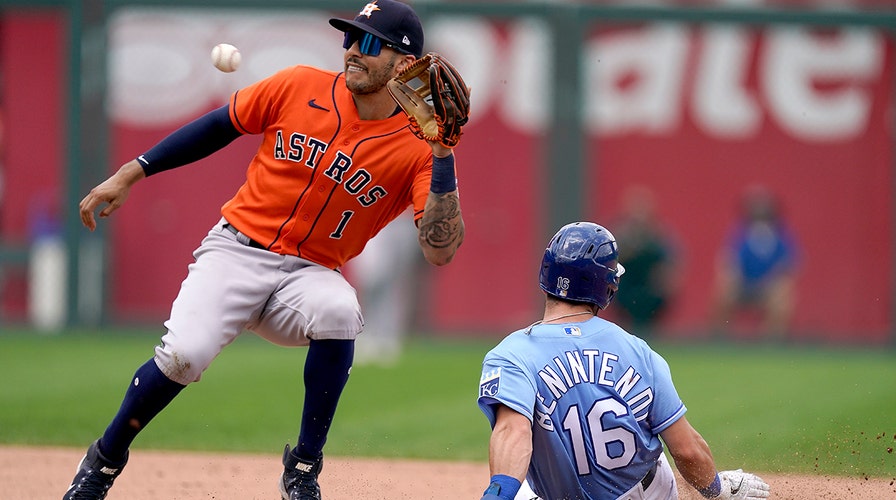 Astros top Royals on bases-loaded walk in 12th 