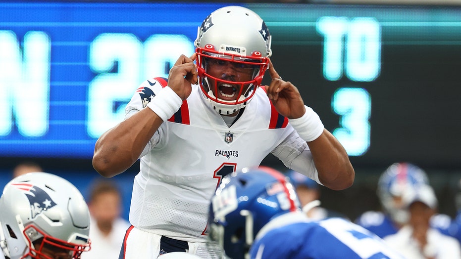 Cam Newton chases Mac Jones for high-five as Patriots’ quarterback competition nears end